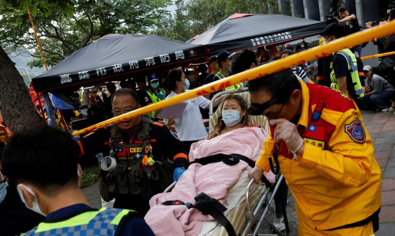 A wounded woman is taken for a medical check-up after being rescued from a remote area, following the earthquake, in Hualien, Taiwan, April 4, 2024. REUTERS/Tyrone Siu