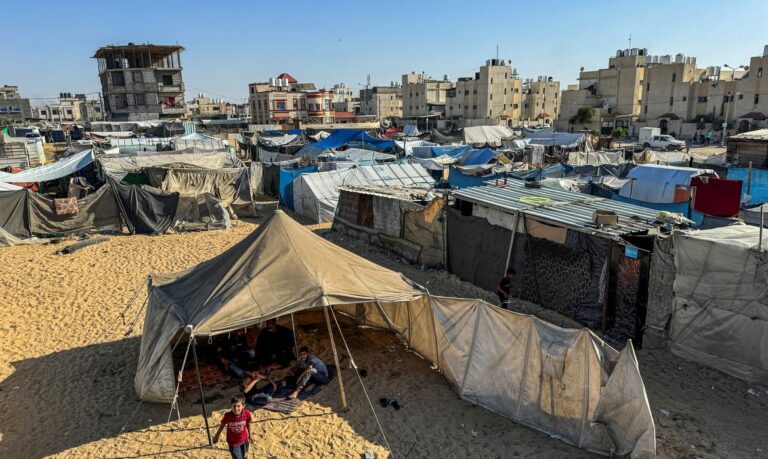 Displaced Palestinians, who fled their house due to Israel's military offensive, shelter in a tent, in Rafah, in the southern Gaza Strip May 13, 2024. REUTERS/Mohammed Salem