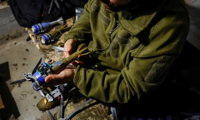 Nazar, 33, a Ukrainian serviceman of the 72nd Chorni Zaporozhtsi Separate Mechanized Brigade of the Ukrainian Armed Forces, prepares a first-person view (FPV) drone to launch it towards Russian troops, during the unilaterally proposed three-day ceasefire declared by Russia, amid Russia's attack on Ukraine, near a frontline in Dnipropetrovsk region, Ukraine May 8, 2025. REUTERS/Alina Smutko