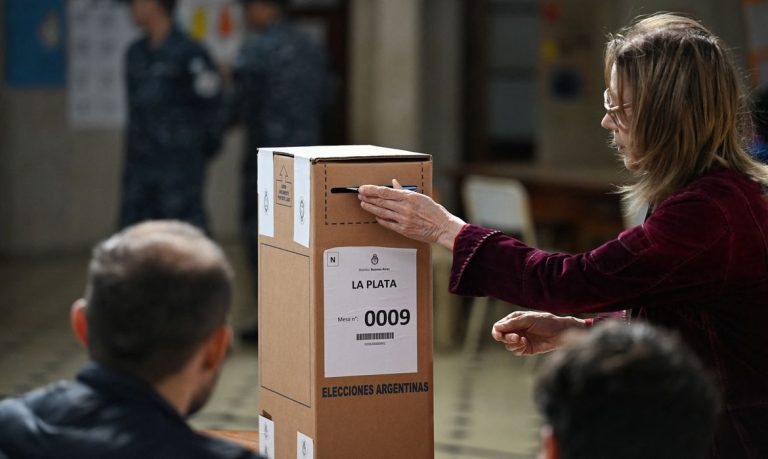 A woman votes at a polling station during the midterm election, in La Plata, Buenos Aires, Argentina, October 26, 2025. REUTERS/Martin Cossarini