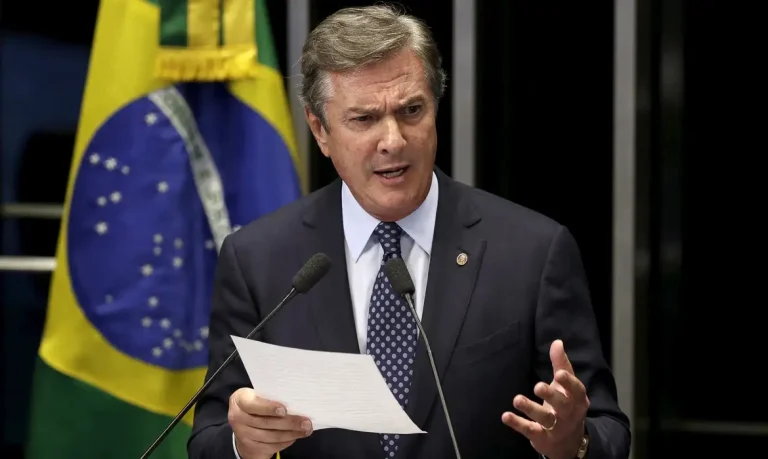 FILE PHOTO: Brazilian Senator Fernando Collor de Mello, a former president, speaks during a session of the Brazilian Federal Senate in Brasilia July 14, 2015. . REUTERS/Ueslei Marcelino/File Photo