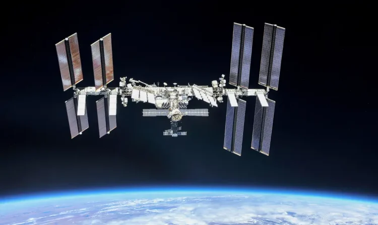 FILE PHOTO: The International Space Station (ISS) photographed by Expedition 56 crew members from a Soyuz spacecraft after undocking, October 4, 2018. NASA/Roscosmos/Handout via REUTERS ATTENTION EDITORS - THIS IMAGE WAS PROVIDED BY A THIRD PARTY/File Photo