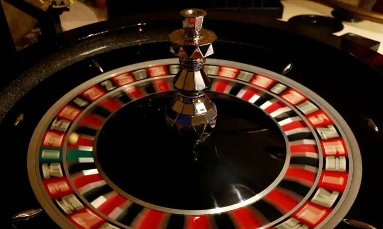 FILE PHOTO: The spinning wheel on a Roulette table is seen at the Dragonara Casino in St Julian's