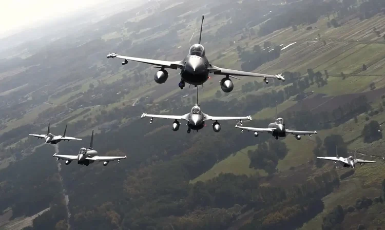 **VIDEO AVAILABLE: CONTACT INFO@COVERMG.COM TO RECEIVE**

Fighter jets from Italy, Poland and the United States took to the skies over NATO’s eastern flank as part of NATO’s Air Shielding mission. The line-up of aircraft included Italian Eurofighters, Polish F-16s and Polish MiG-29s and United States F-22s. The planned one-day series of aerial manoeuvres were conducted from Łask Air Base in Poland on 12 October 2022.

NATO’s Air Shielding mission is an increased air and missile defence posture along the Alliance’s eastern flank, implemented in the wake of Russia’s brutal invasion of Ukraine. Allies have deployed more fighter jets and ground-based air and missile defence systems to protect Allies along the eastern flank against possible air and missile threats. This is purely defensive, and a key component of NATO's enhanced deterrence and defence posture. NATO’s Air Shielding involves deployments ranging from a few weeks to several months at air bases and key locations in the eastern part of the Alliance.

Footage includes aerial manoeuvres of Italian Eurofighters, Polish F-16s and MiG-29s, and US F-22s.

The aerial manoeuvres come amid increased tensions on NATO's Eastern flank due to Russia's war in Ukraine and threats from Kremlin leaders to members of the NATO Alliance.

Where: Łask Air Base, Poland
When: 12 Oct 2022
Credit: US Air Force/Cover Images

**EDITORIAL USE ONLY. MATERIALS ONLY TO BE USED IN CONJUNCTION WITH EDITORIAL STORY. THE USE OF THESE MATERIALS FOR ADVERTISING, MARKETING OR ANY OTHER COMMERCIAL PURPOSE IS STRICTLY PROHIBITED. MATERIAL COPYRIGHT REMAINS WITH STATED SUPPLIER.**