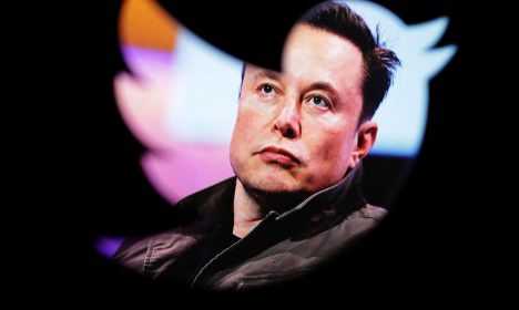 Illustration shows Elon Musk's photo and Twitter logo