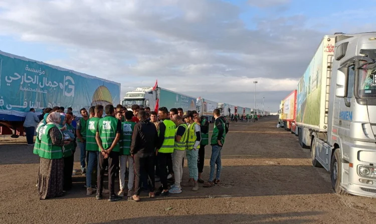 Groups carrying humanitarian aid for Palestinians wait for Rafah crossing to open