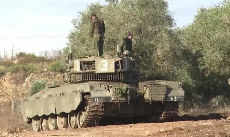 Israeli tanks along Lebanon border after overnight artillery exchange