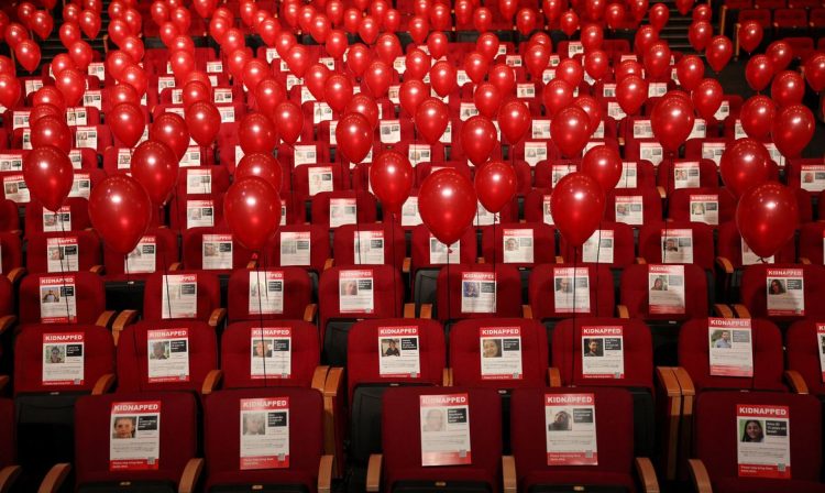 Pictures of Israeli hostages kidnapped by Hamas on October 7, accompany thousands of balloons as part of an installation called