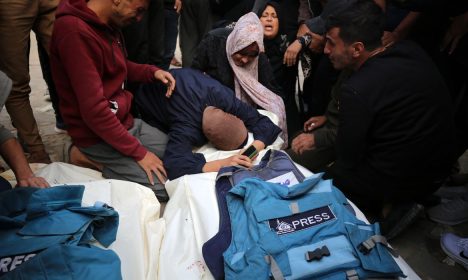 Journalists, relatives and friends pray over the body Journalists Sari Mansour and Hassouna Esleem after they were killed When a house was hit in the Israeli bombardment they were inside it of Bureij camp in the central Gaza Strip on November 19, 2023, amid the ongoing battles between Israel and the Palestinian group Hamas.  (Photo by Majdi Fathi/NurPhoto)NO USE FRANCE