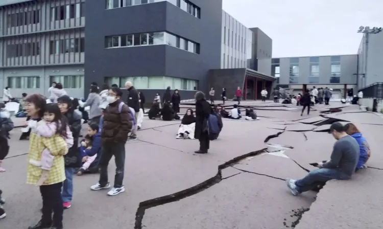 Road cracks caused by an earthquake is seen in Wajima, Ishikawa prefecture, Japan January 1, 2024, in this photo released by Kyodo. Mandatory credit Kyodo via REUTERS ATTENTION EDITORS - THIS IMAGE WAS PROVIDED BY A THIRD PARTY. MANDATORY CREDIT. JAPAN OUT. NO COMMERCIAL OR EDITORIAL SALES IN JAPAN