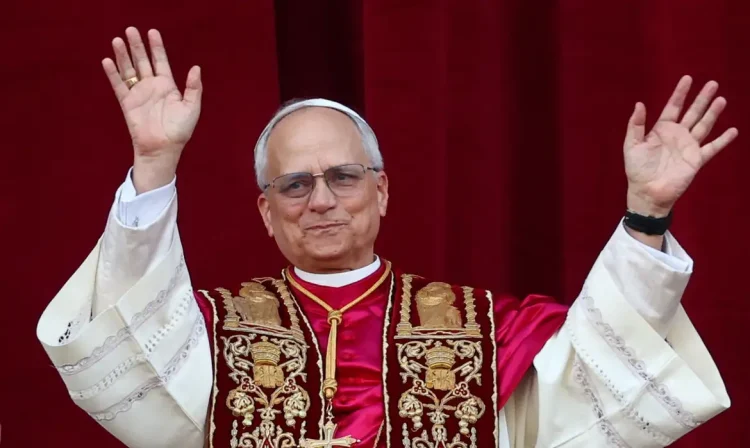Newly elected Pope Leo XIV, Cardinal Robert Prevost of the United States appears on the balcony of St. Peter's Basilica, at the Vatican, May 8, 2025. REUTERS/Guglielmo Mangiapane