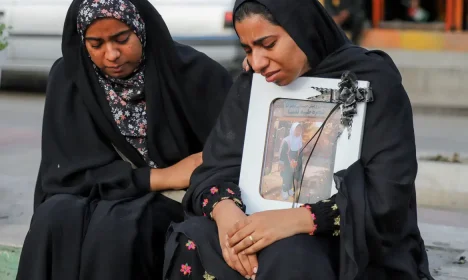 People mourn on the day of the funeral of the victims following a reported strike on a school in Minab, Iran, March 3, 2026. Amirhossein Khorgooei/ISNA/WANA (West Asia News Agency) via REUTERS ATTENTION EDITORS - THIS PICTURE WAS PROVIDED BY A THIRD PARTY. TPX IMAGES OF THE DAY     REFILE – REMOVING ATTRIBUTION TO STRIKE