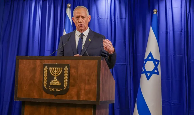 Israeli Minister Benny Gantz addresses the media after his ultimatum to withdraw his centrist party from Israeli Prime Minister Benjamin Netanyahu’s emergency government expired, in Ramat Gan, Israel June 9, 2024. REUTERS/Nir Elias