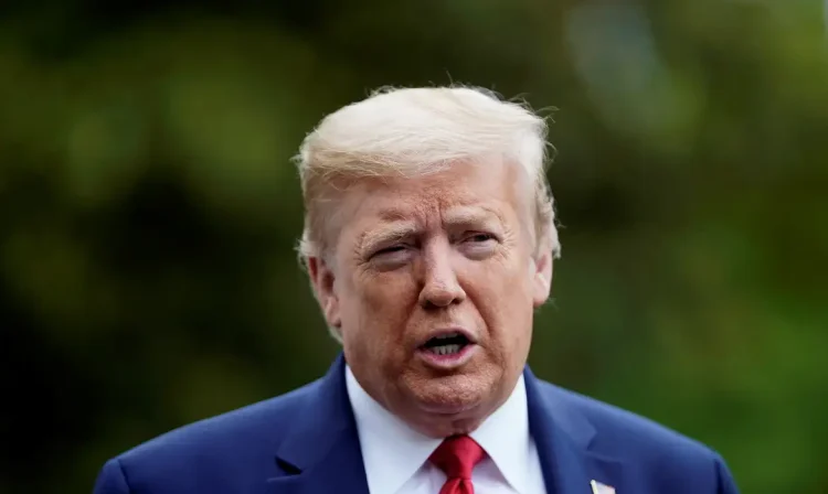 U.S. President Donald Trump speaks to reporters after arriving from Camp David to the White House in Washington, U.S. May 17, 2020. REUTERS/Eric Thayer