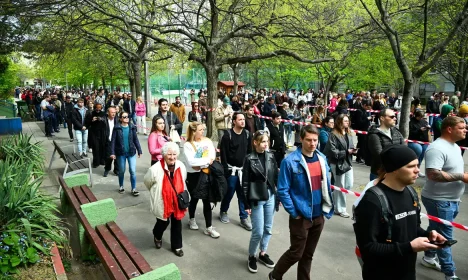 People wait in queue to vote outside a polling station during the Hungarian parliamentary election in Budapest, Hungary, April 12, 2026. REUTERS/Elisabeth Mandl