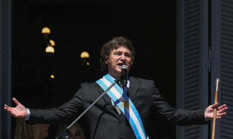 Argentina's President Javier Milei addresses supporters from the Casa Rosada balcony, after his swearing-in ceremony, in Buenos Aires, Argentina December 10, 2023. REUTERS/Agustin Marcarian