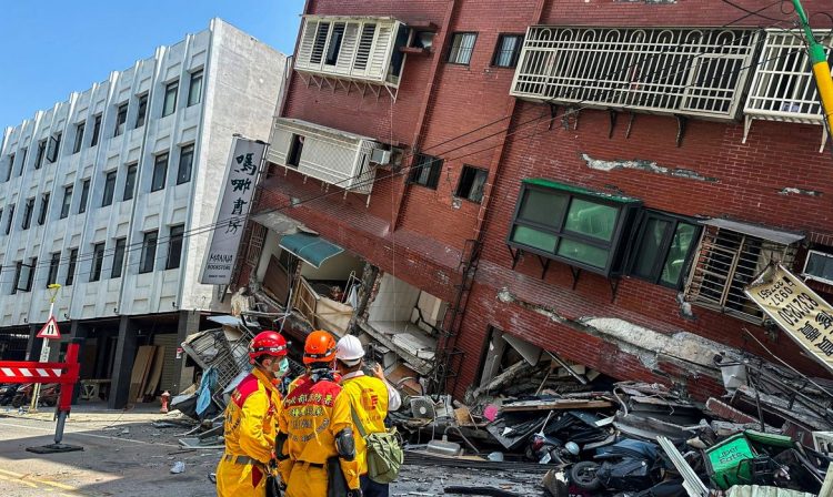 Firefighters work at the site where a building collapsed following the earthquake, in Hualien, Taiwan, in this handout provided by Taiwan's National Fire Agency on April 3, 2024. Taiwan National Fire Agency/Handout via REUTERS  ATTENTION EDITORS - THIS IMAGE WAS PROVIDED BY A THIRD PARTY. NO RESALES. NO ARCHIVES.